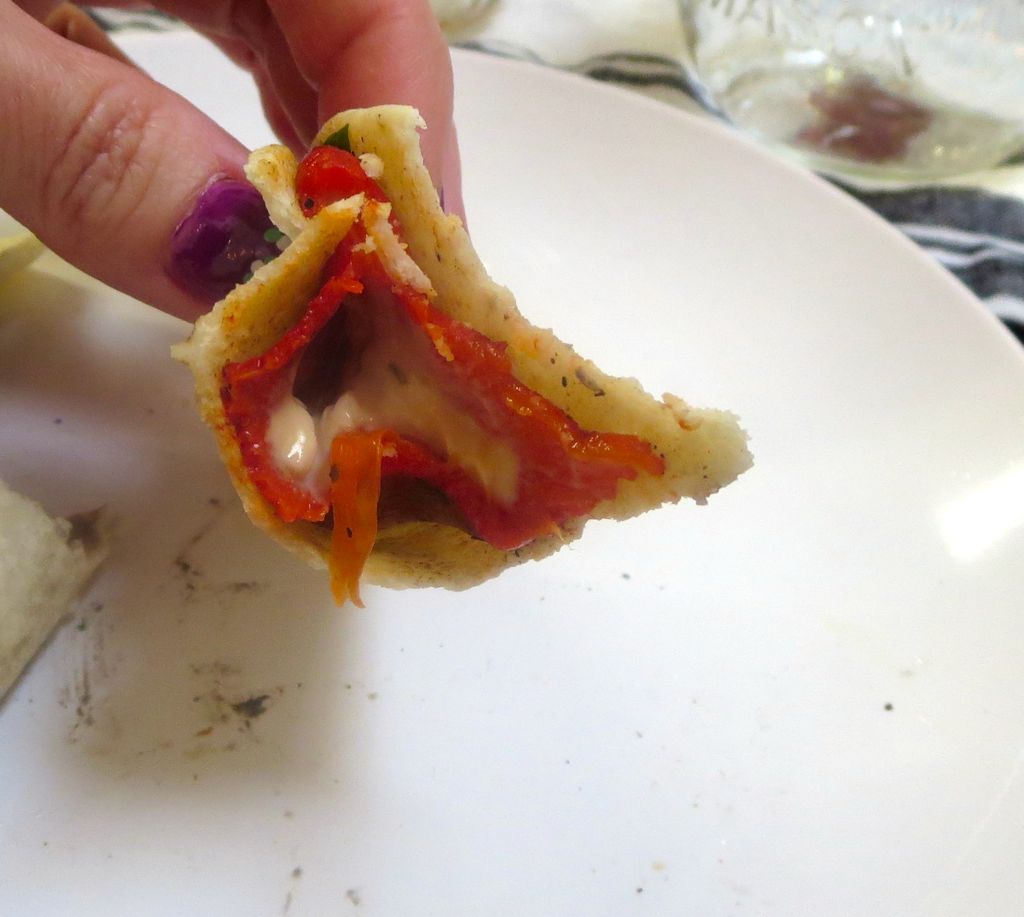 rellenos pepper stuffed with cashew cheese inside a tortilla