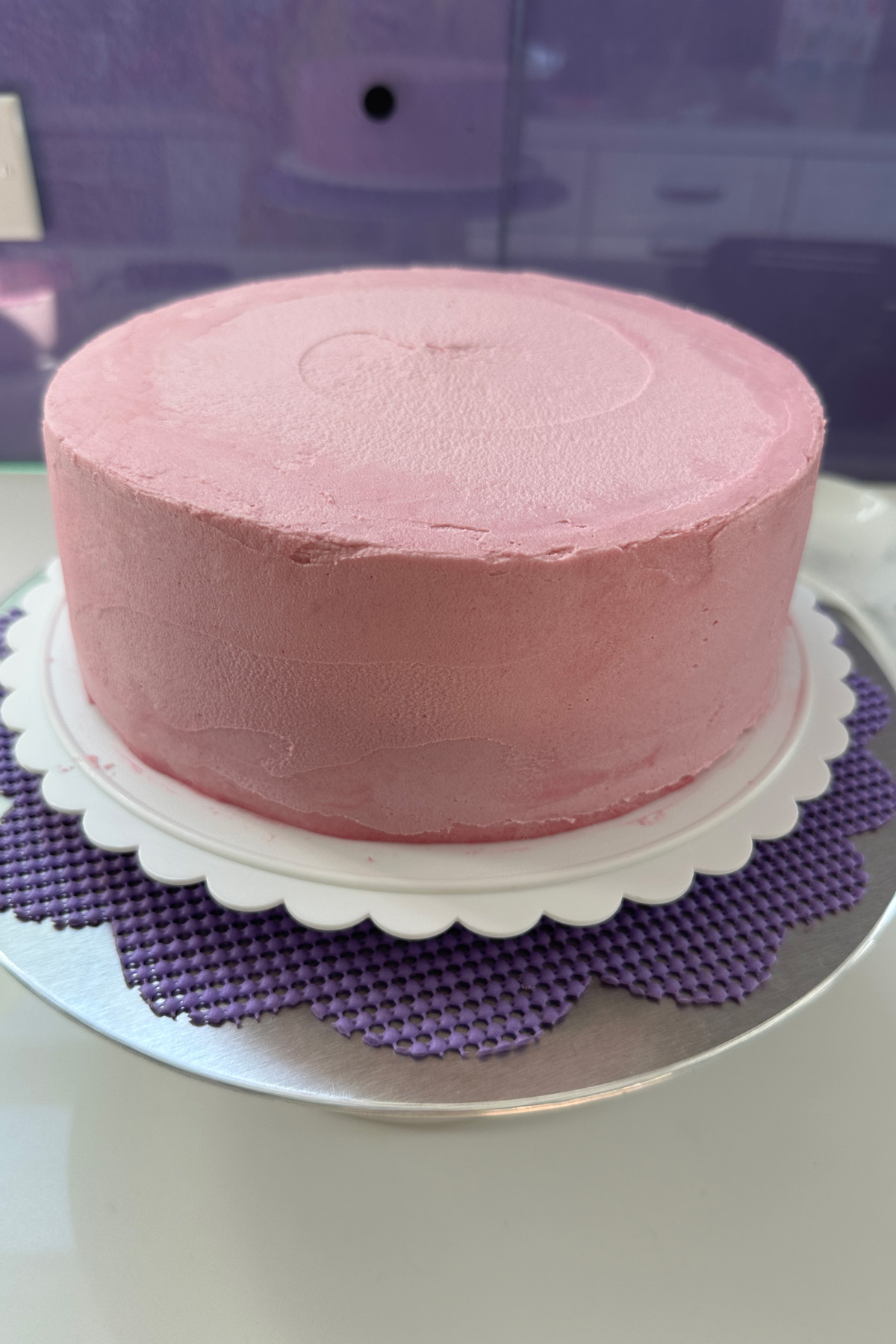 the nutella cake covered with pink frosting