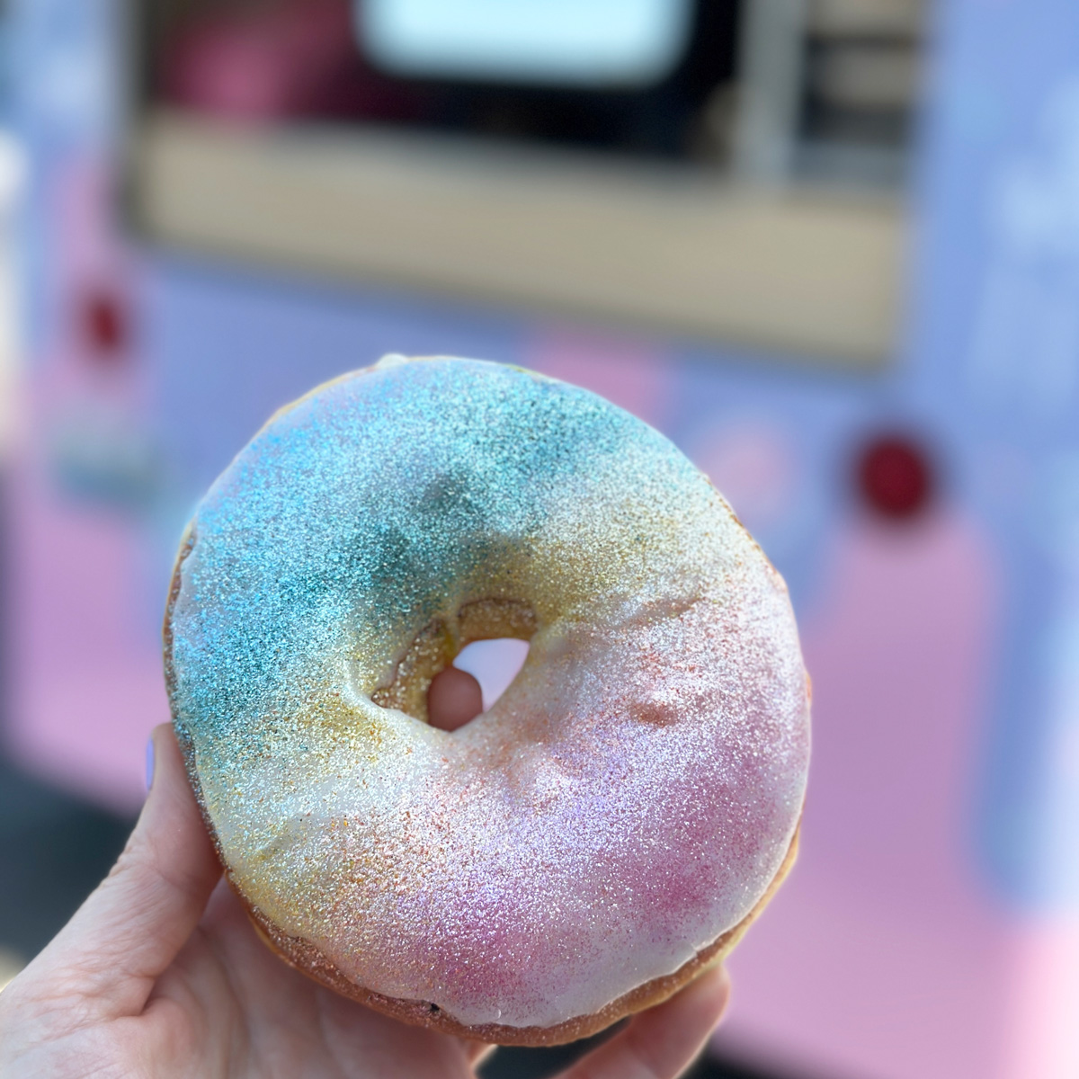 vegan rainbow glitter doughnut from Dough Joy