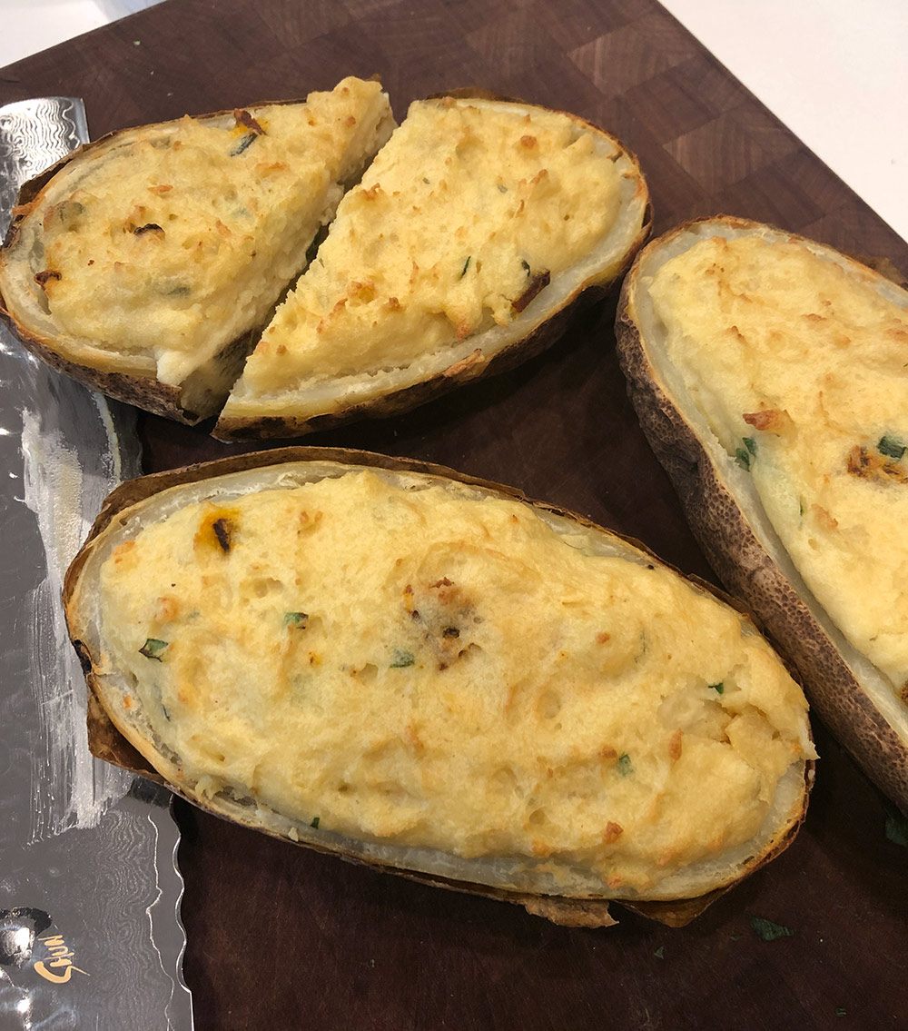 cutting the twice baked potatoes at a diagonal