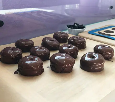 mini pumpkin spice donuts dipped in chocolate