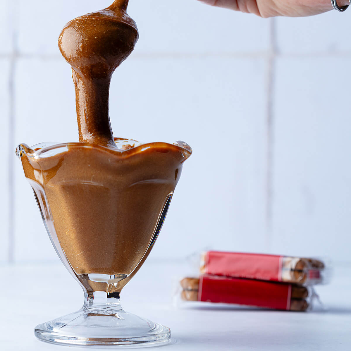 a spoonful of thick vegan biscoff sauce