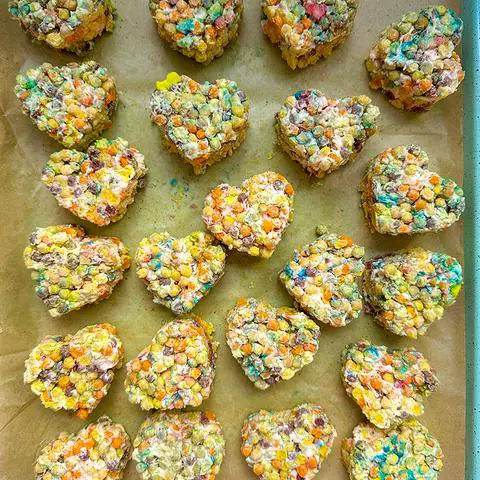 mini rainbow vegan cereal treats cut in the shape of hearts