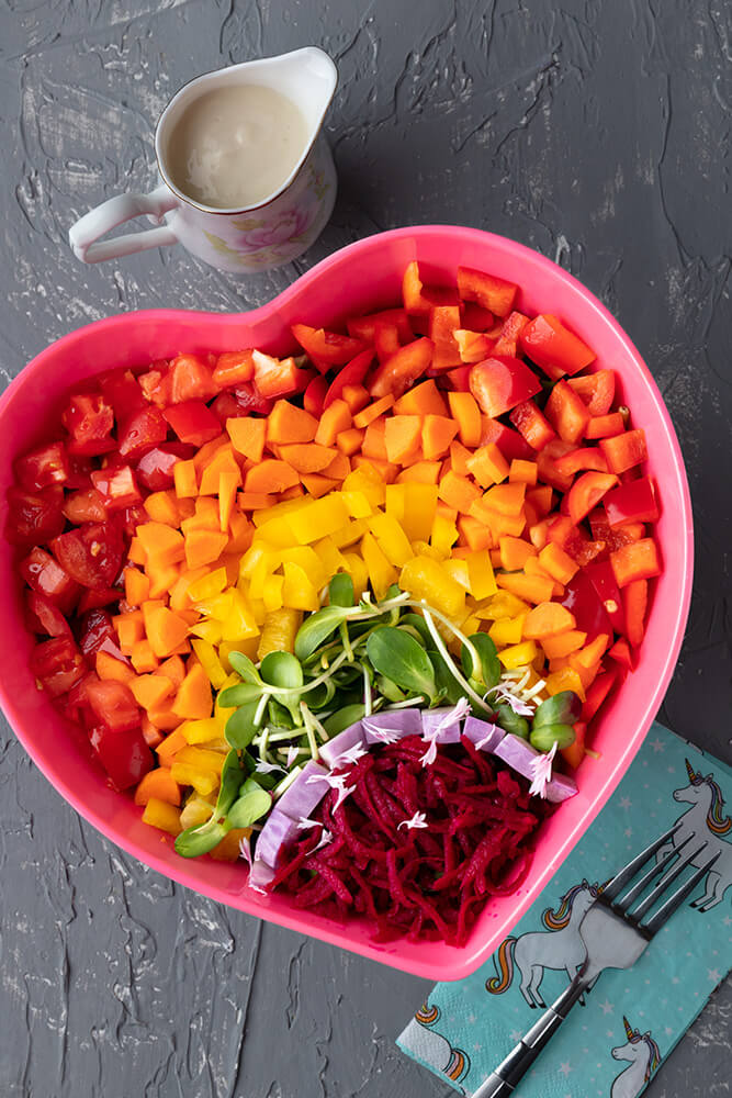 rainbow salad with caesar dressing on the side