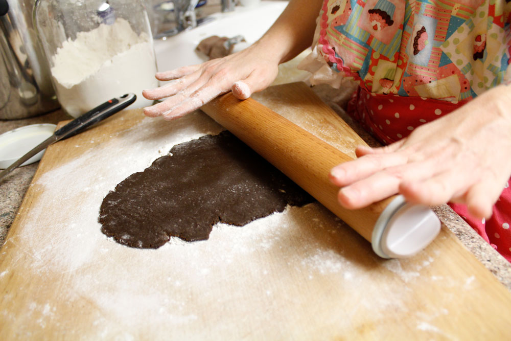 rolling out vegan gingerbread dough