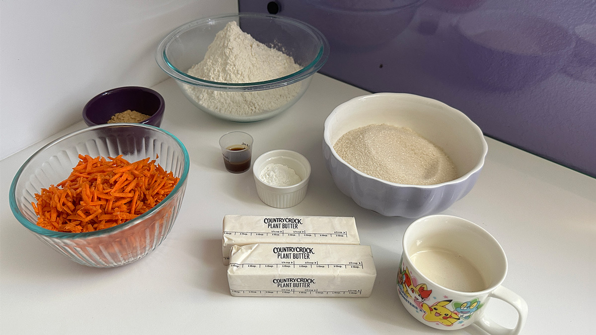 the ingredients you need to make carrot cake cookies (icing ingredients aren’t showing)