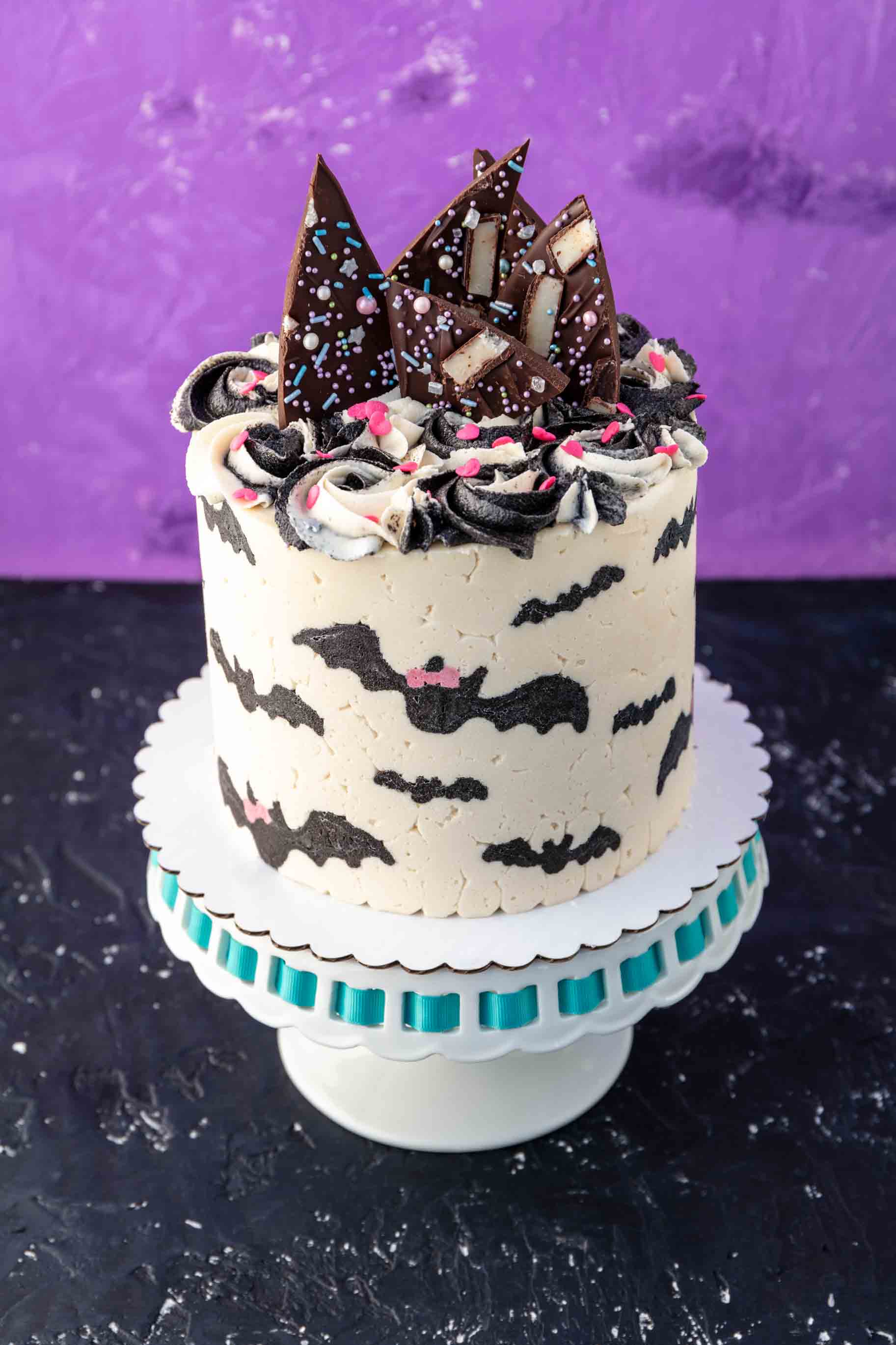 vegan halloween cake with bats all over the sides