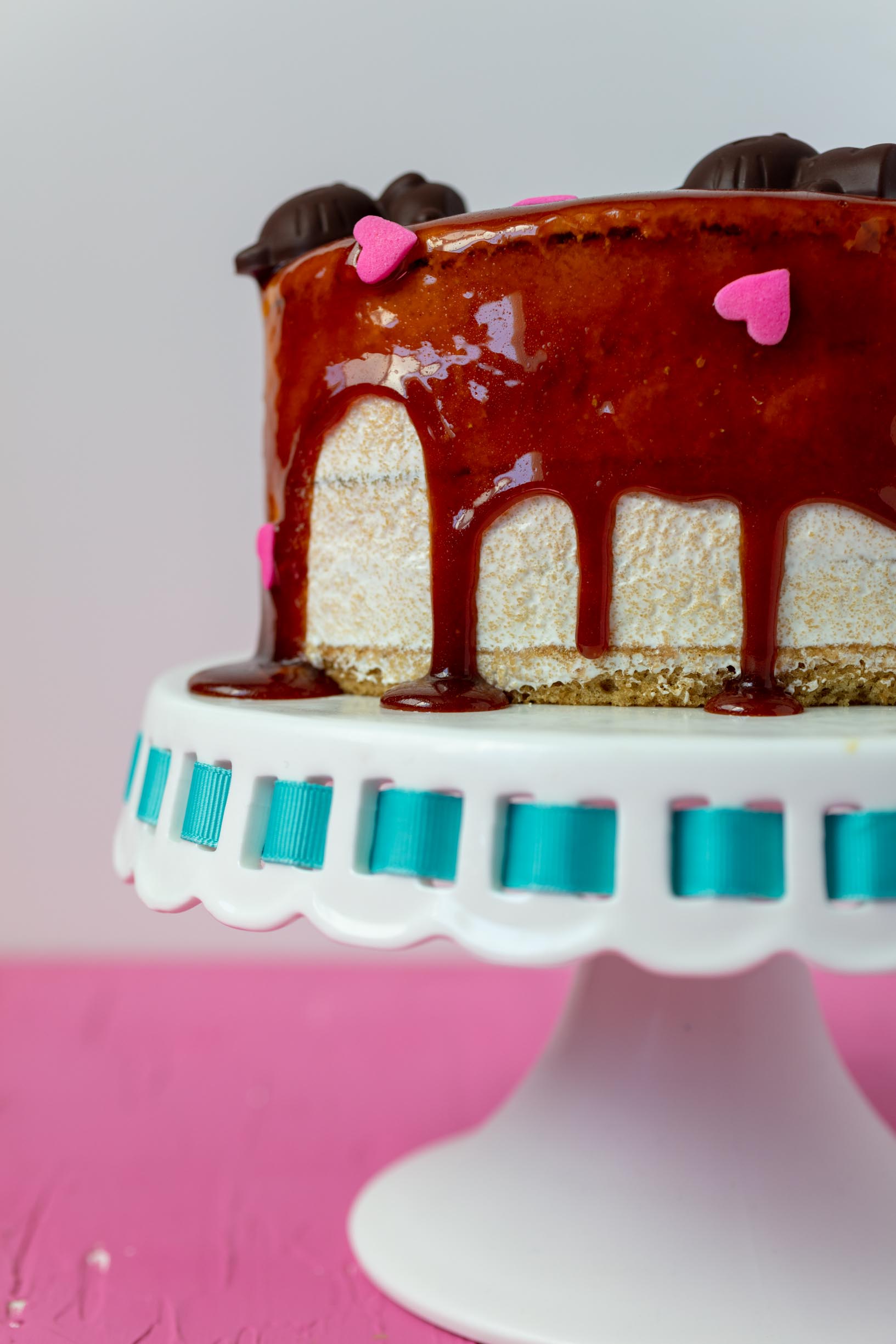 vegan caramel sauce dripping down the sides of the cake