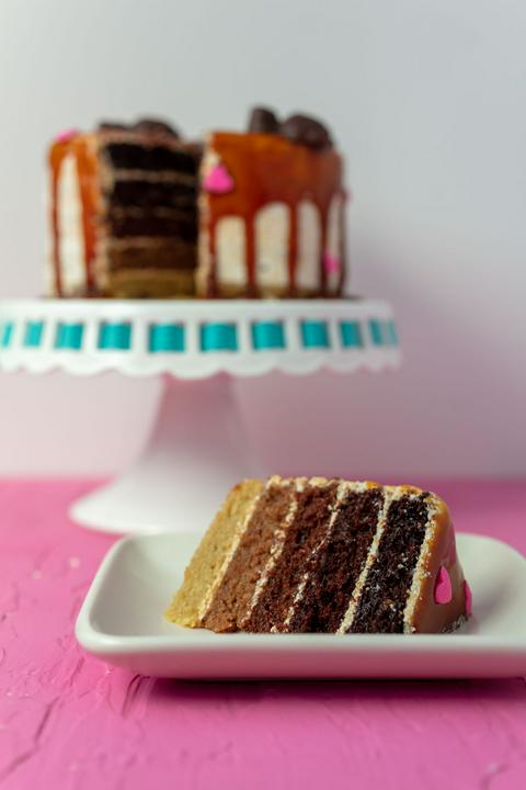 slice of vegan chocolate caramel ombré heart cake