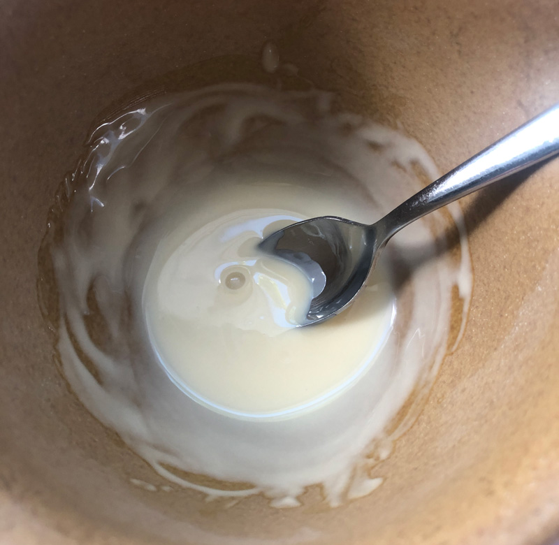 vegan white chocolate melted and ready for decorating the chocolate peanut butter pretzels