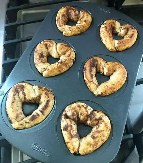 cinnamon roll donuts fresh from the oven