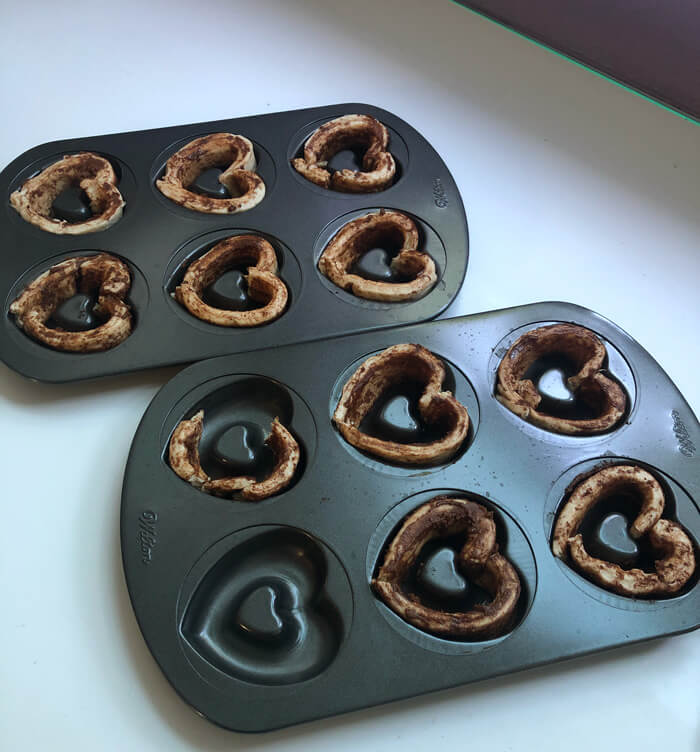 cinnamon roll donuts ready to go into the oven