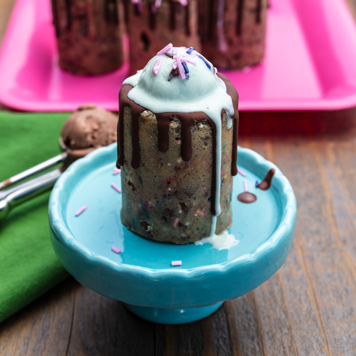 a vegan mini ice cream sundae in a cup make of gluten-free cookie dough