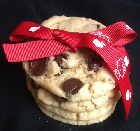 stack of vegan chocolate chip cookies tied with a bow