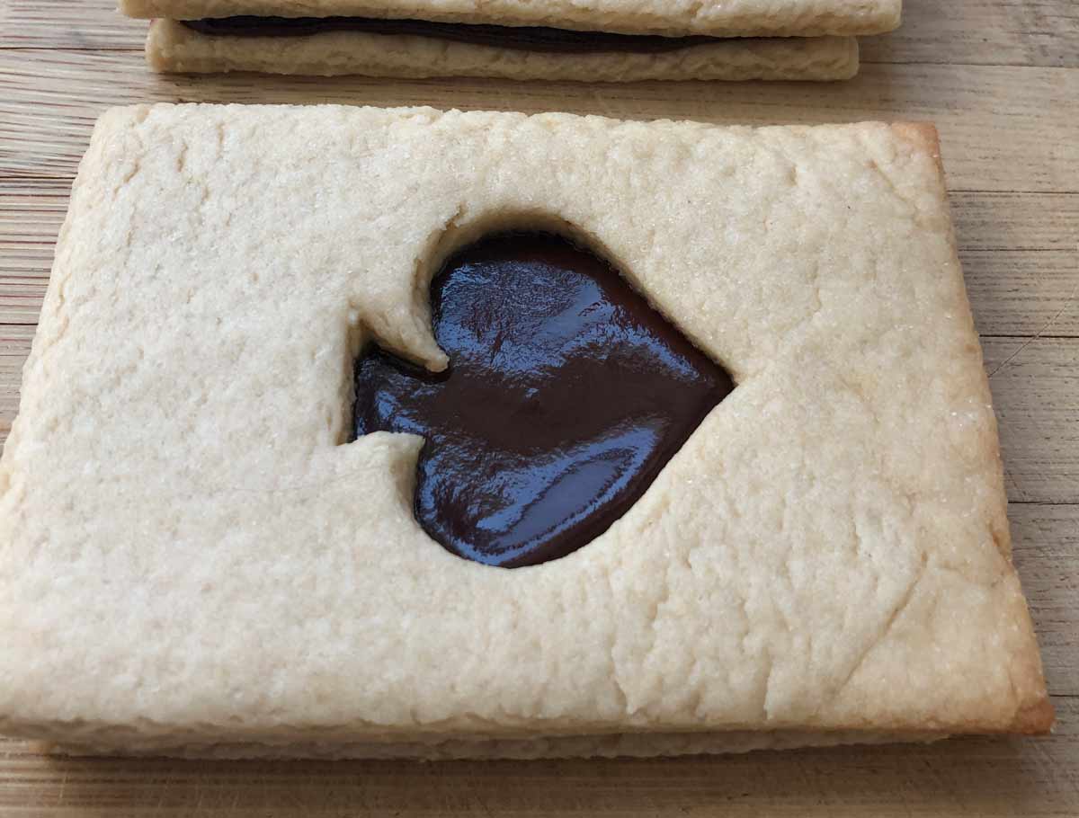 vegan chocolate sandwich cookie that looks like a playing card