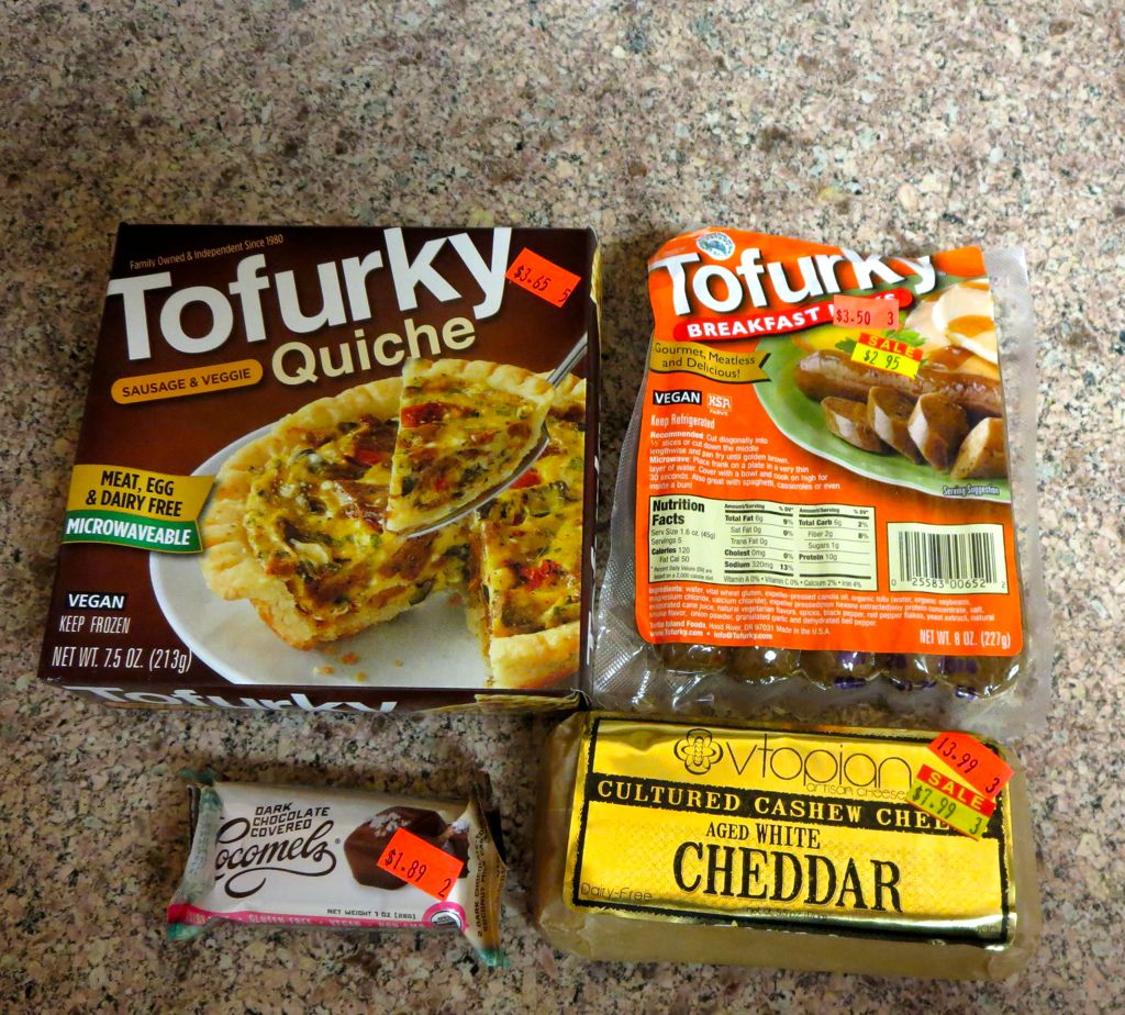 Tofurkey Quiche and breakfast sausages, chocolate covered cocomels, and Vtopian cheese