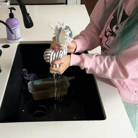 squeezing the water out of my tofu.