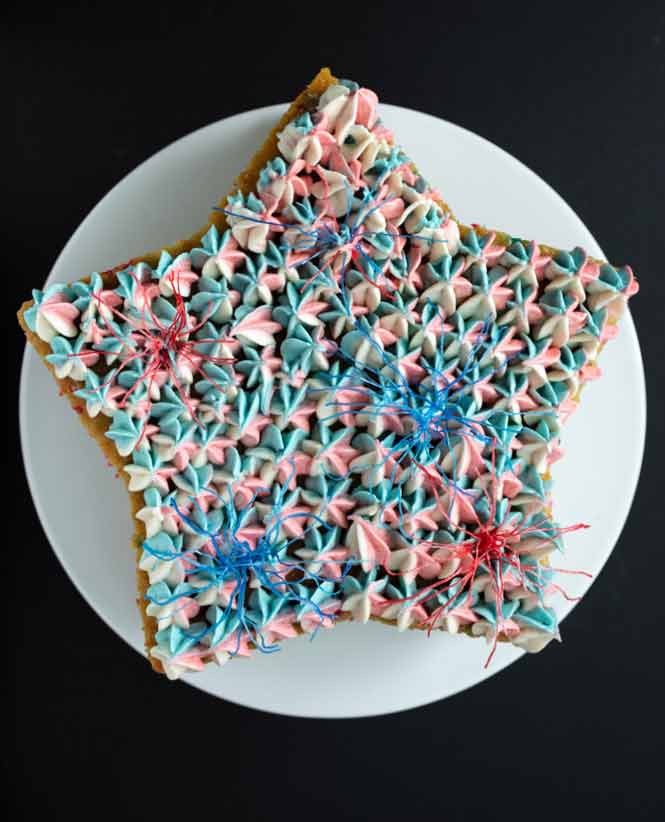 vegan funfetti lemonade cake with pastel red, white, and blue frosting