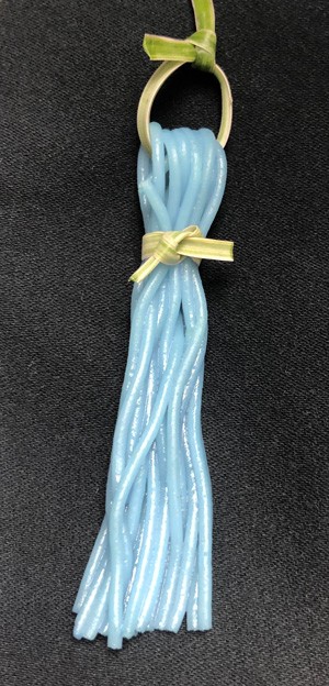 graduation hat tassel made from blue angel hair pasta