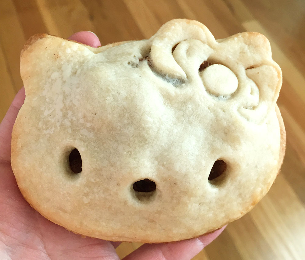 vegan apple hand pie in the shape of hello kitty