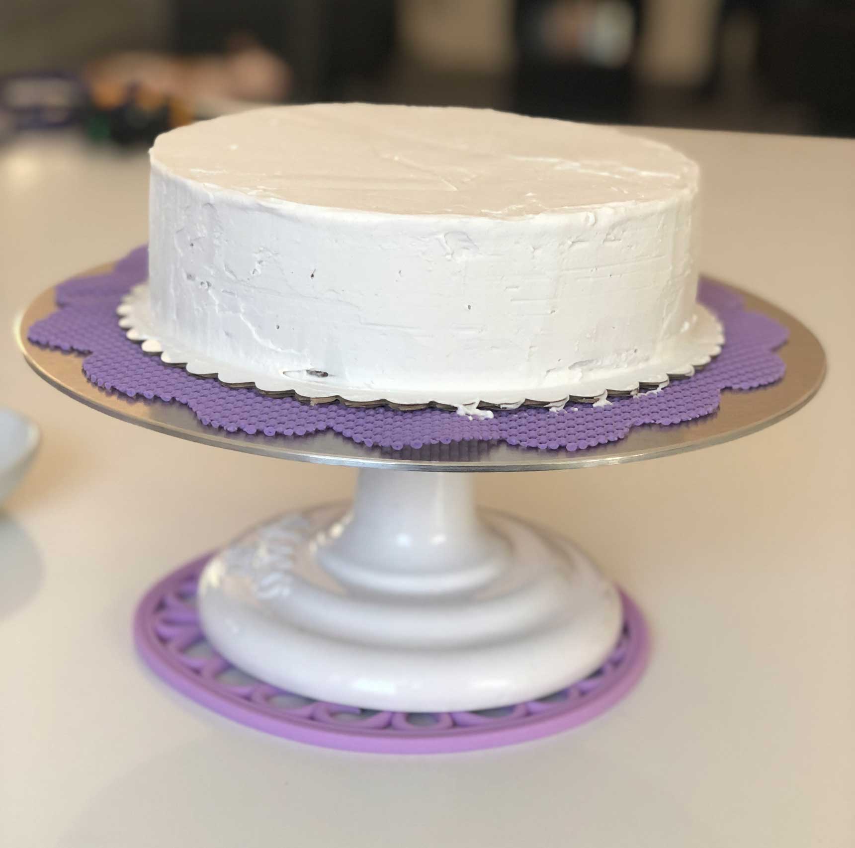 vegan ice cream cake covered in whipped cream