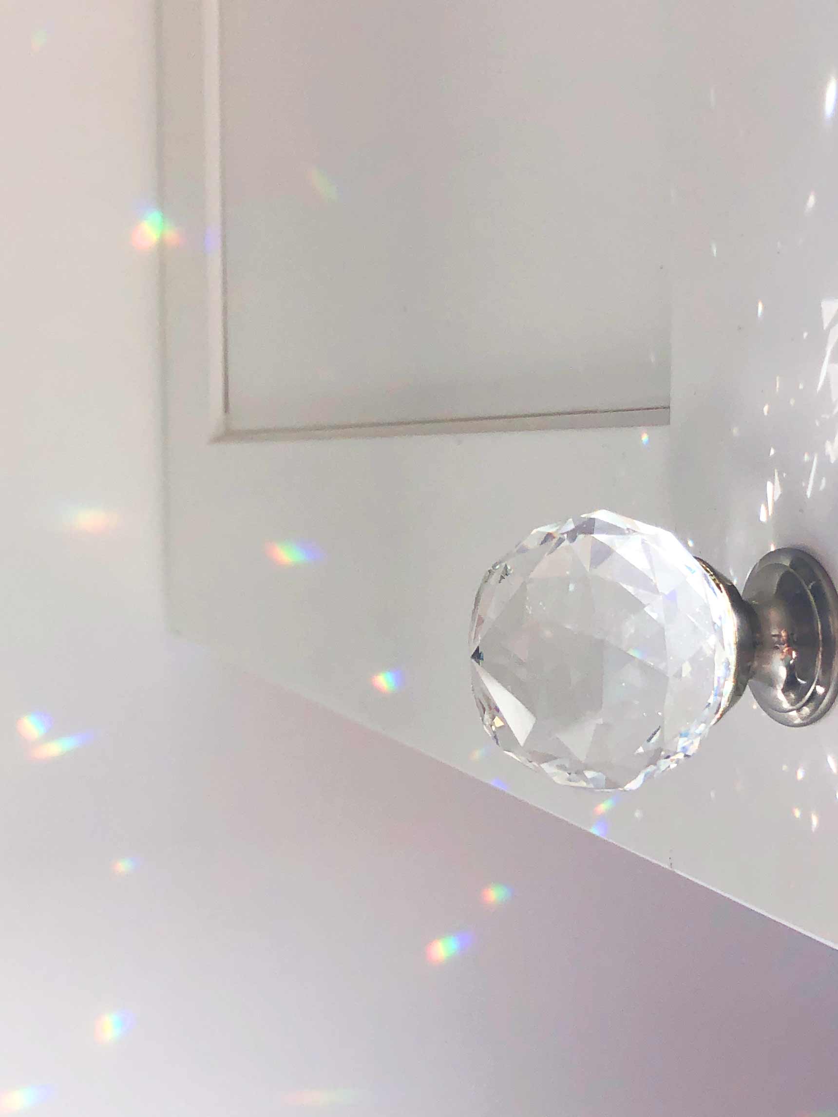one of my upper cabinets with a crystal ball knob