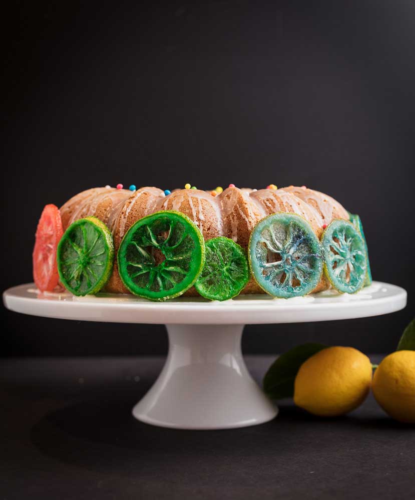 Vegan lemon cake with rainbow candied lemon slices