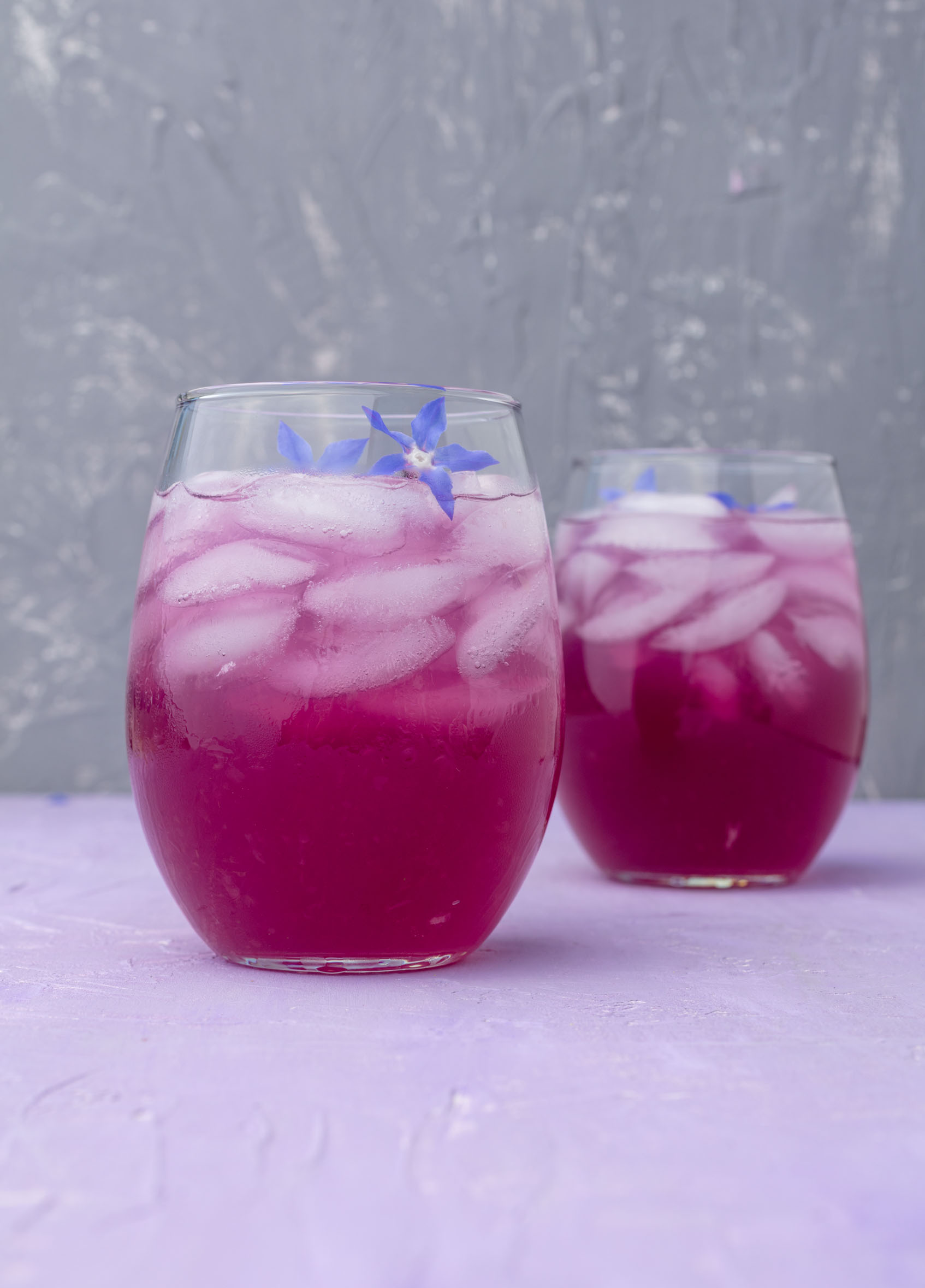 low sugar purple lemonade naturally colored with butterfly pea flowers