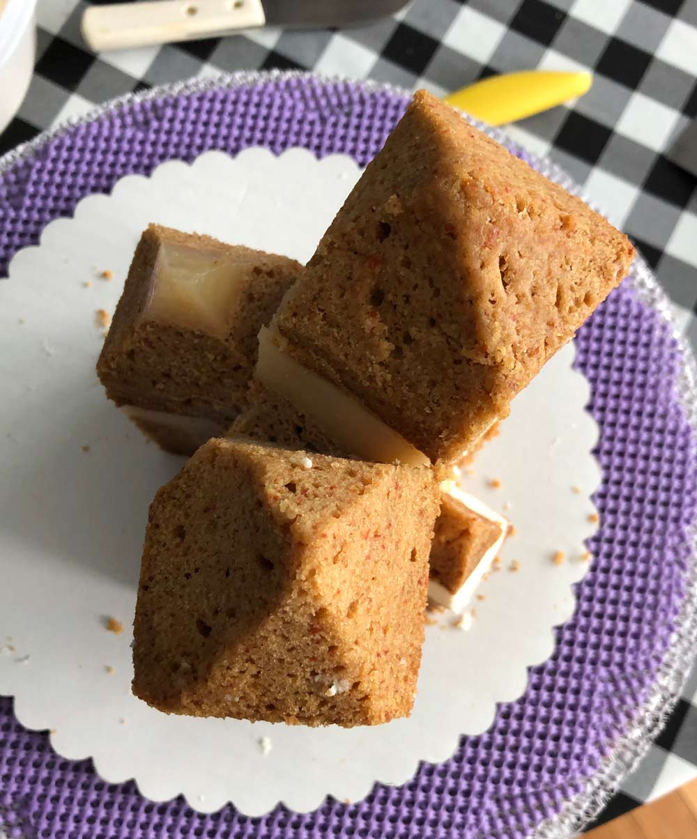 carving a vegan crystal shaped cake