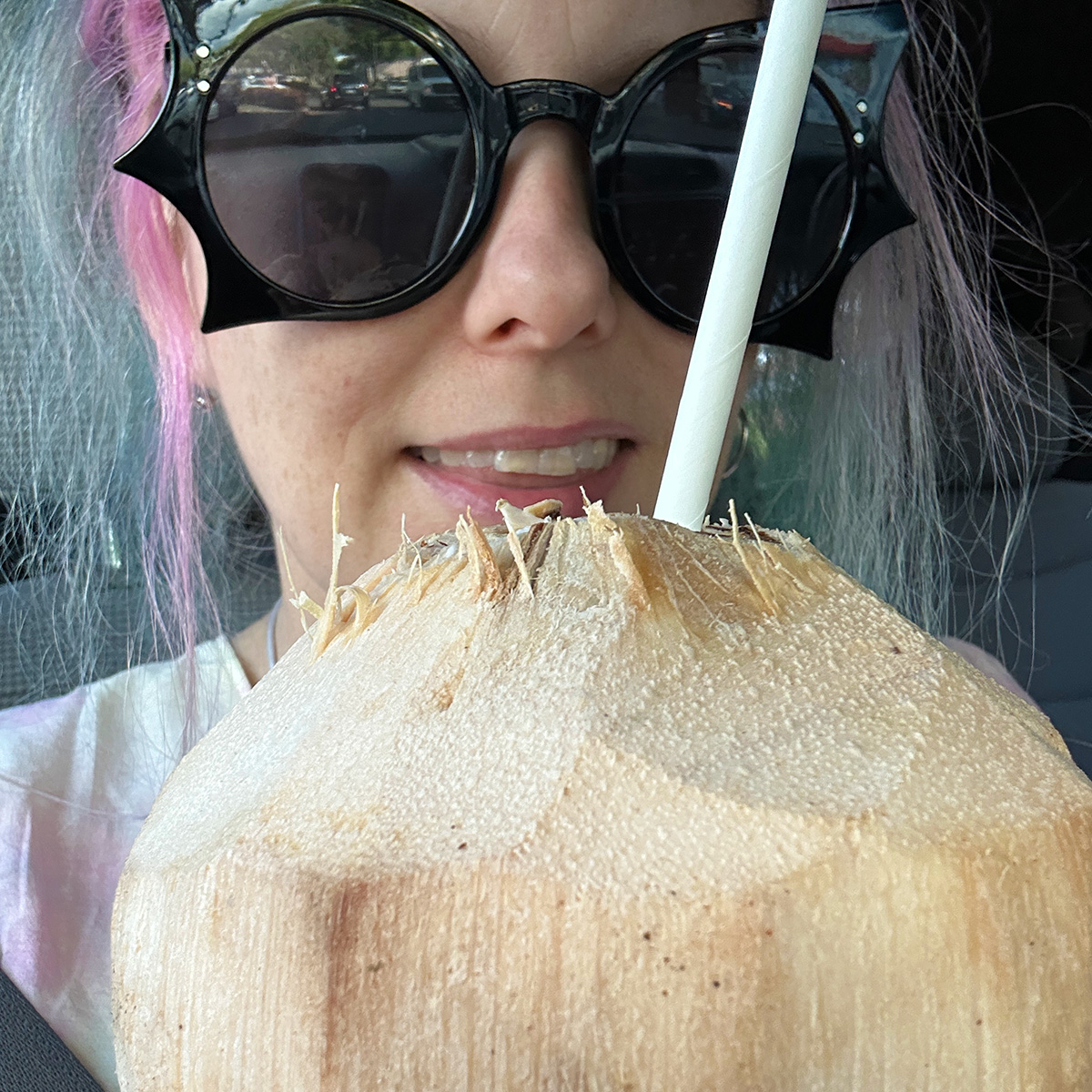 me with my coconut with a straw in Maui.