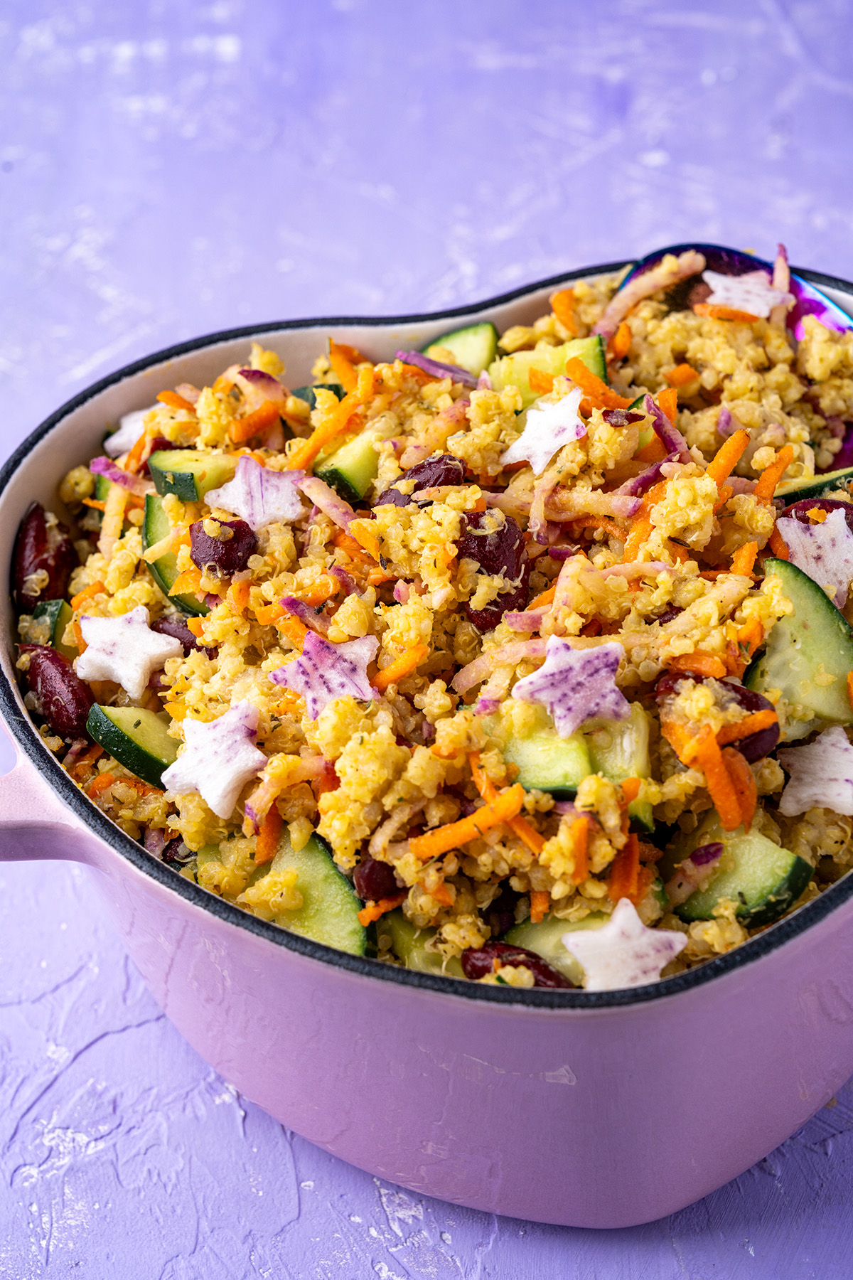 gluten-free and vegan millet and veggie salad in a pink dutch oven