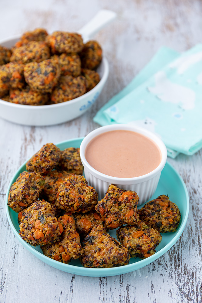 a plate of millet tots with dip