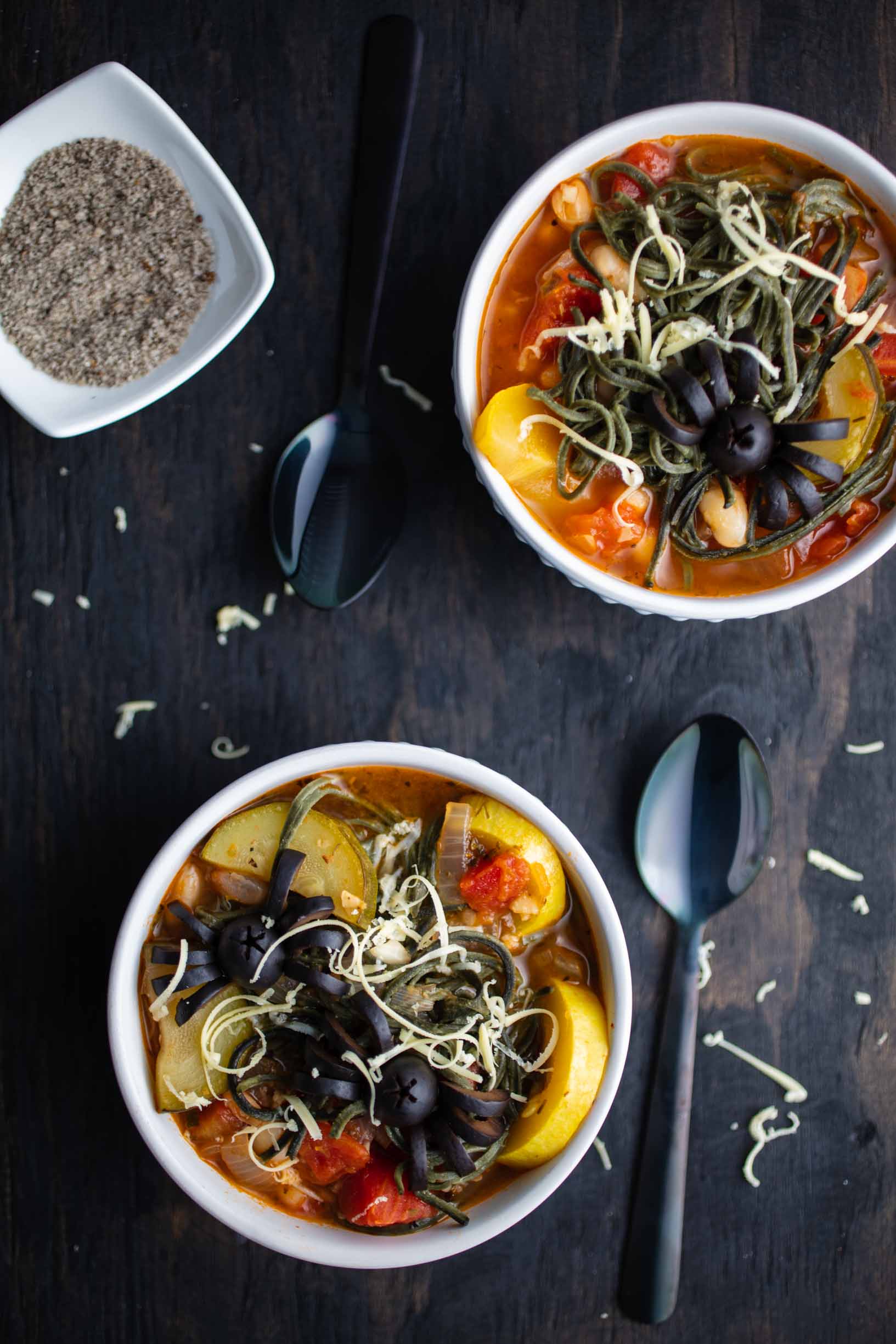 vegan gluten-free minestrone soup garnished with vegan cheese