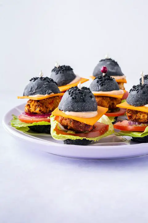 plate of bite sized veggie burgers.