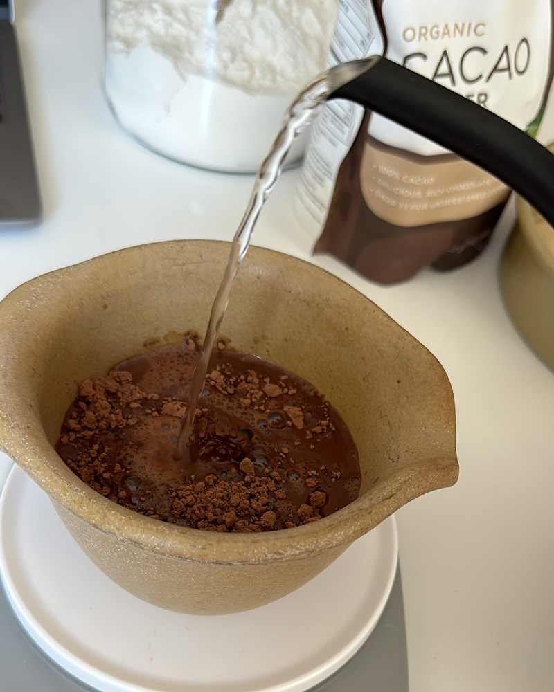 blooming the cocoa powder for the nutella cake