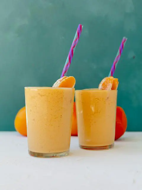 two tall glasses of vegan orange julius