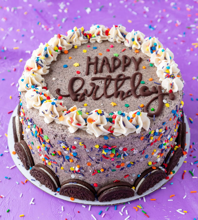 vegan oreo cake decorated to fit inside a cake box