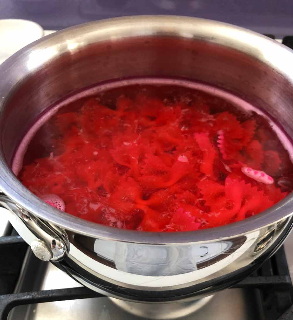 pink colored pasta water