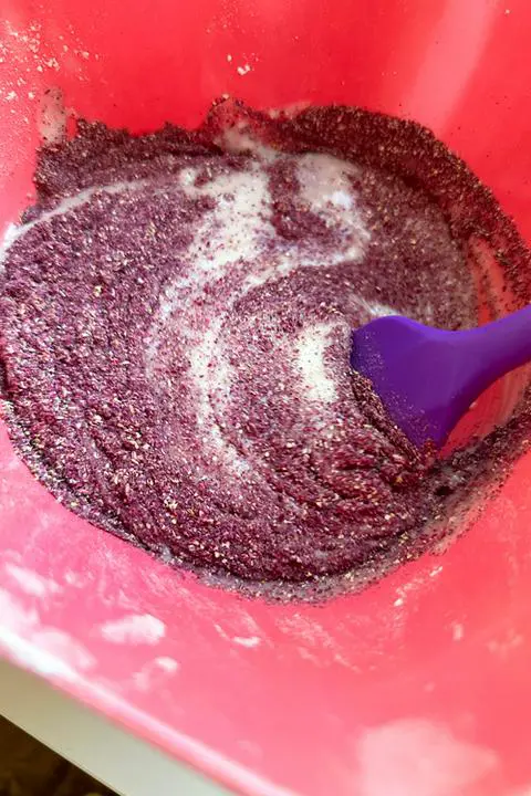 mixing rose powder into half of the cake batter