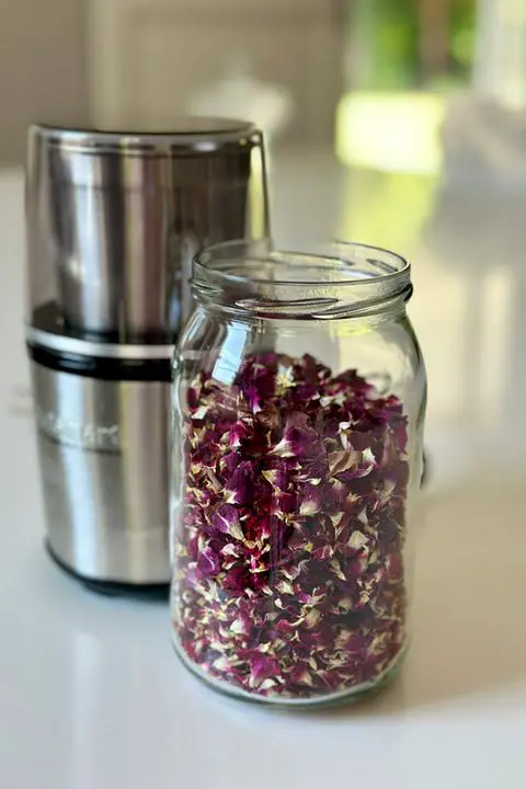 a jar of dried rose petals that I grew in my front yard