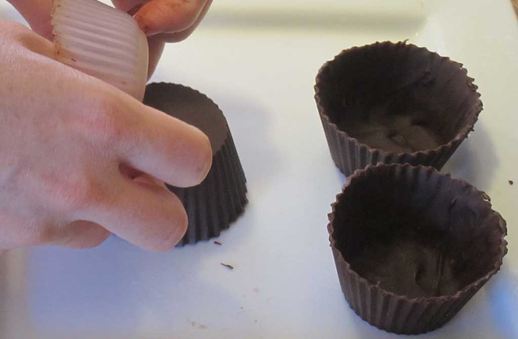 popping the chocolate out of the molds