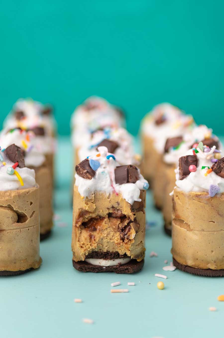 vegan mini candy bar pumpkin cheesecakes