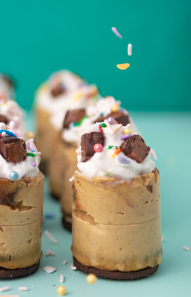 vegan mini candy bar pumpkin cheesecakes