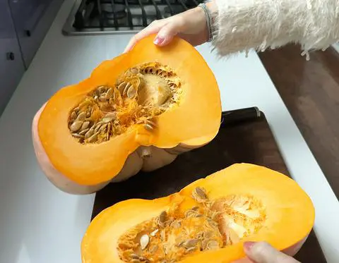 a cinderella pumpkin cut in half.