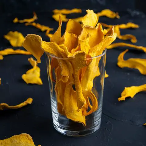 dried pumpkin for dogs in a glass.