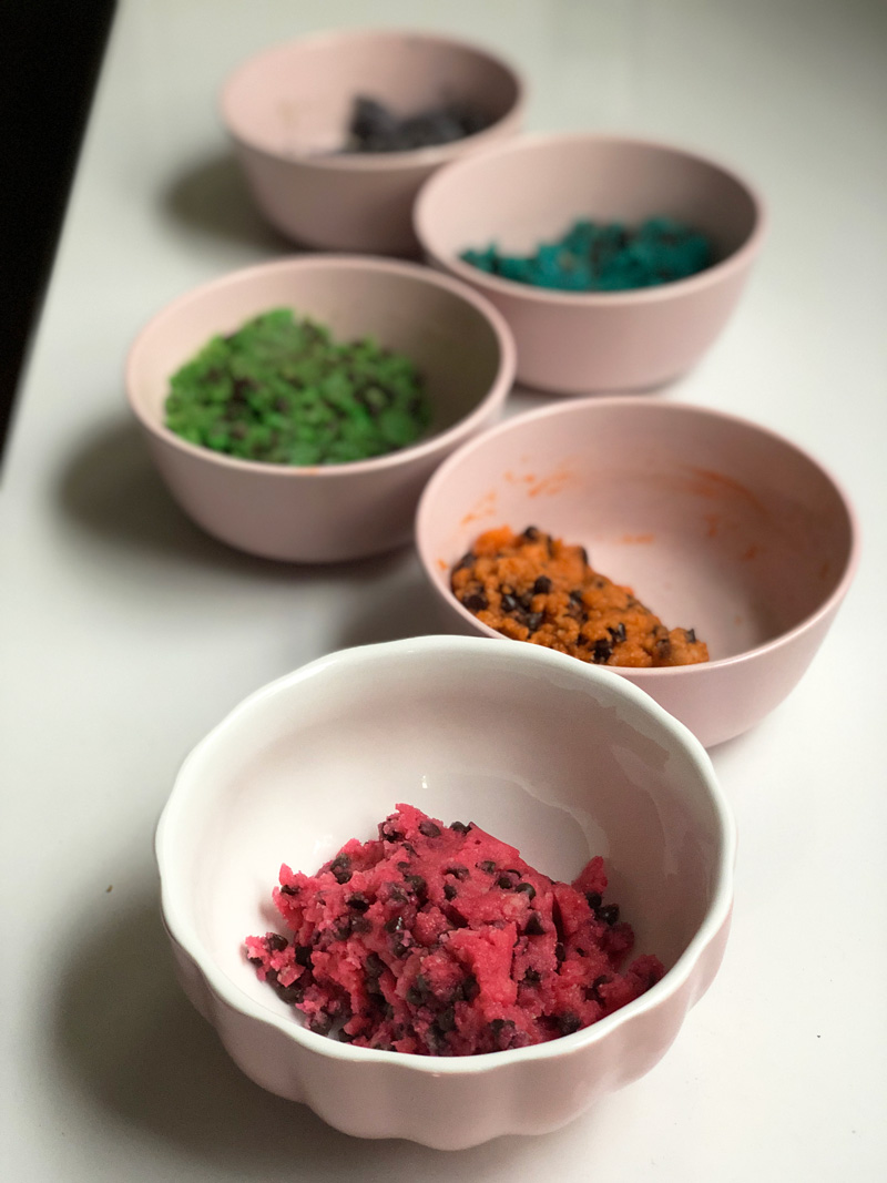 5 bowls of different colored cookie dough
