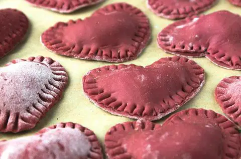 naturally colored vegan pink heart ravioli filled with tofu and spinach