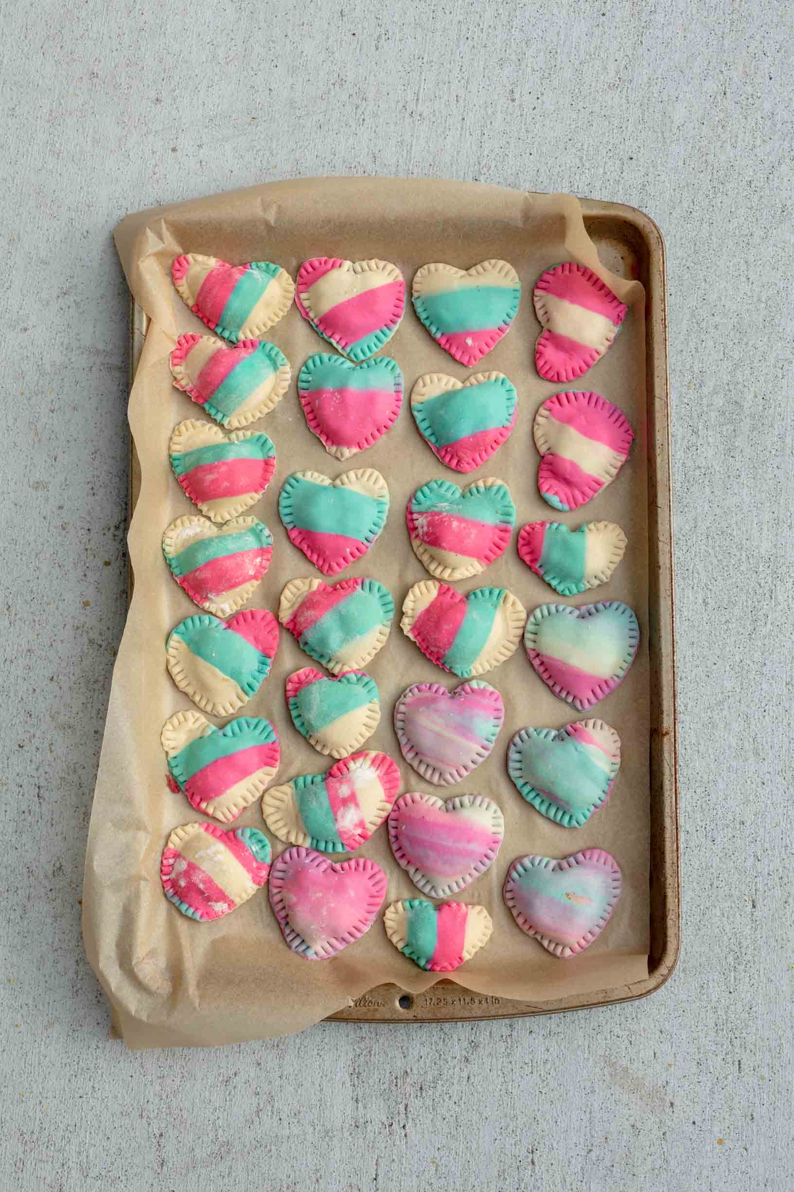 vegan heart shaped trans pride ravioli ready to be boiled