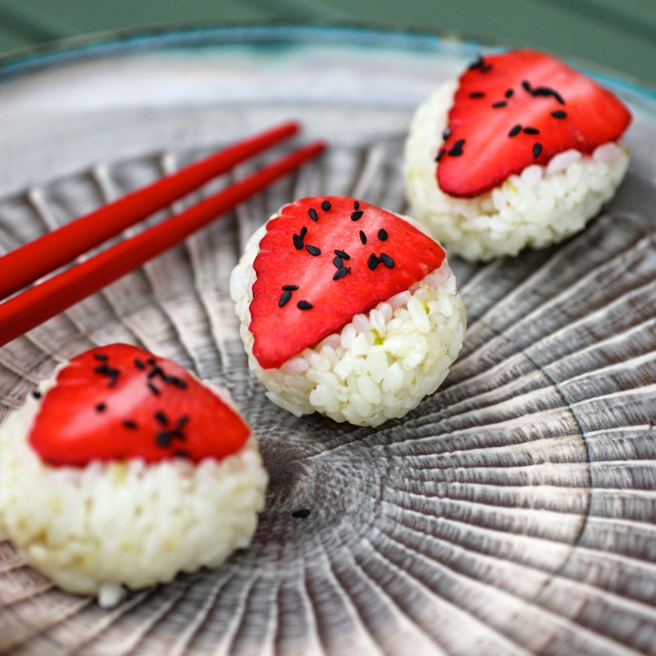 strawberry sushi with chocolate sauce