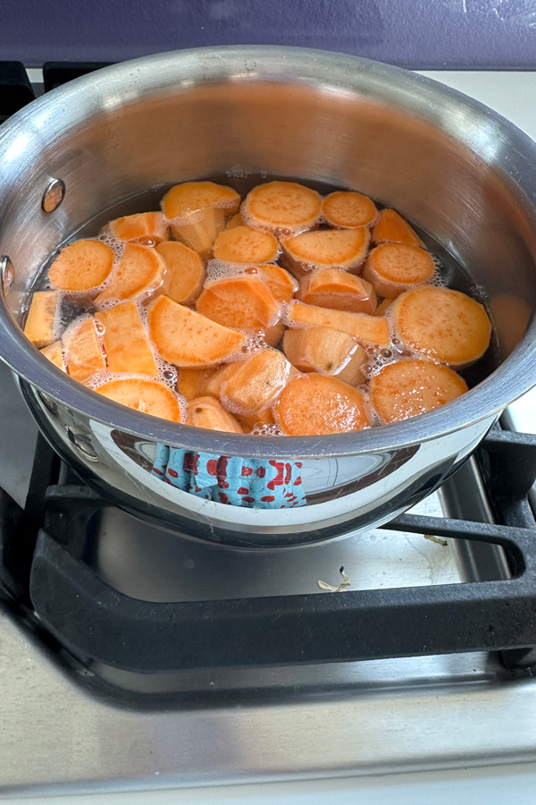 boiling the vegan sweet potatoes